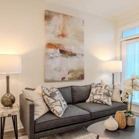 Relax and unwind in stylish living spaces a living room with a couch and a coffee table