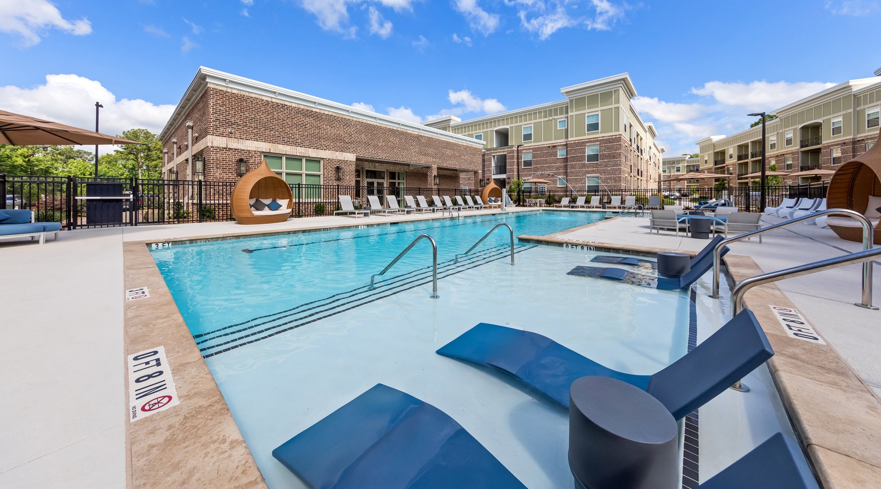 pool with lounge seating