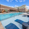 pool with lounge seating